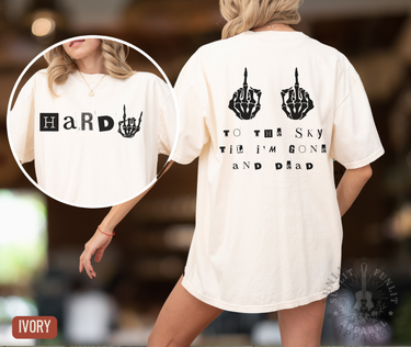 A person wearing a white t-shirt with a graphic design on the back.